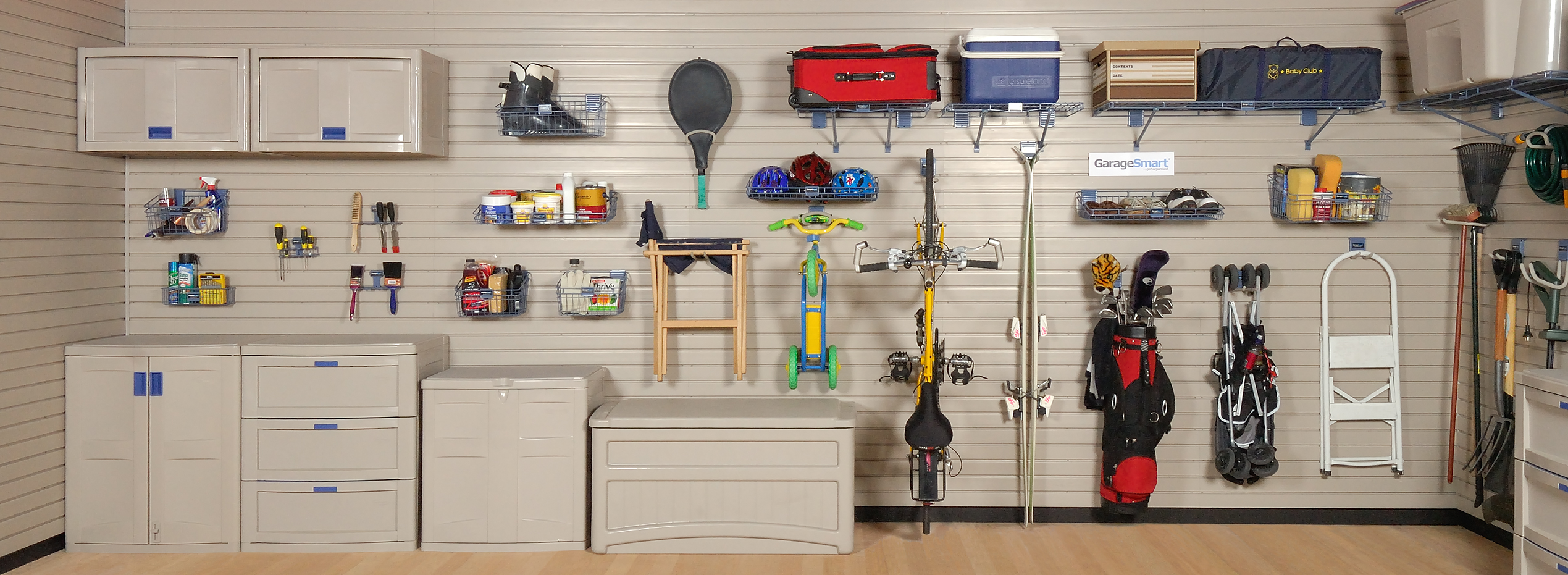 garage wall with hanging tools and sports equipment
