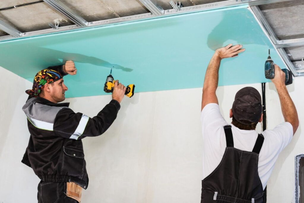 plasterboard installers men assembling drywall false ceiling simple affordable renovation premises 1024x682